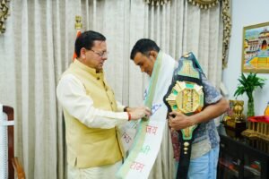 मुख्यमंत्री  पुष्कर सिंह धामी से एमएफएन लाइटवेट विश्व चैम्पियन दिगंबर सिंह रावत ने की शिष्टाचार भेंट